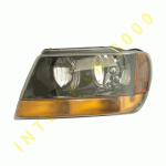 HEAD LAMP LEFT SMOKED WITH LOWER YELLOW INDICATOR MANUAL LAREDO JEEP GRAND CHEROKEE 99-05